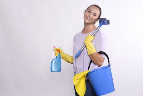 Window cleaning service in E1 on a London street with urban surroundings